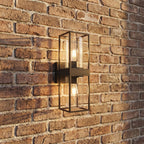 Rectangular Black Metal and Glass Outdoor Wall Light, close view at 45 degrees on a stone wall