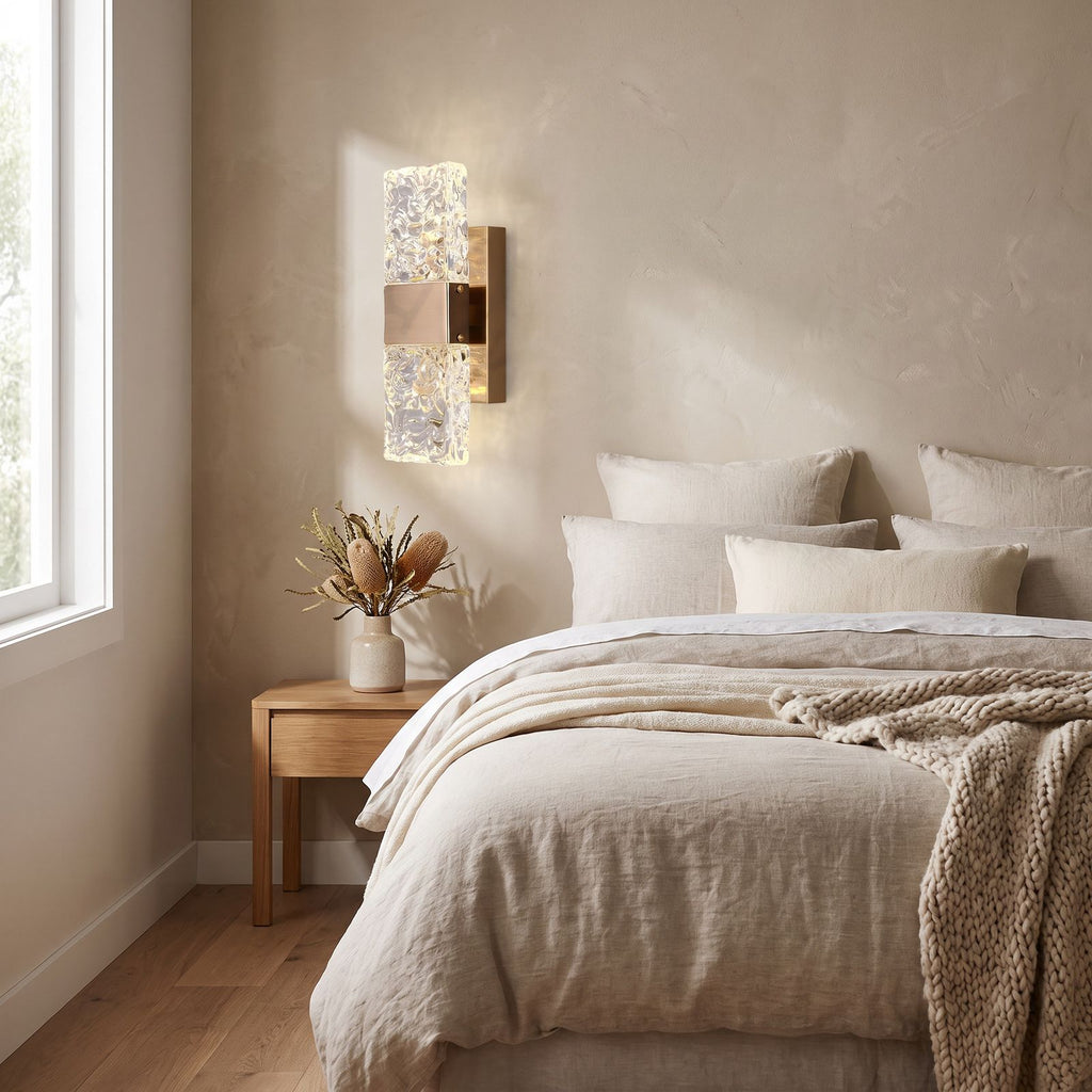 Rectangular Textured Crystal Up Down Wall Light on a bedroom wall beside the bed