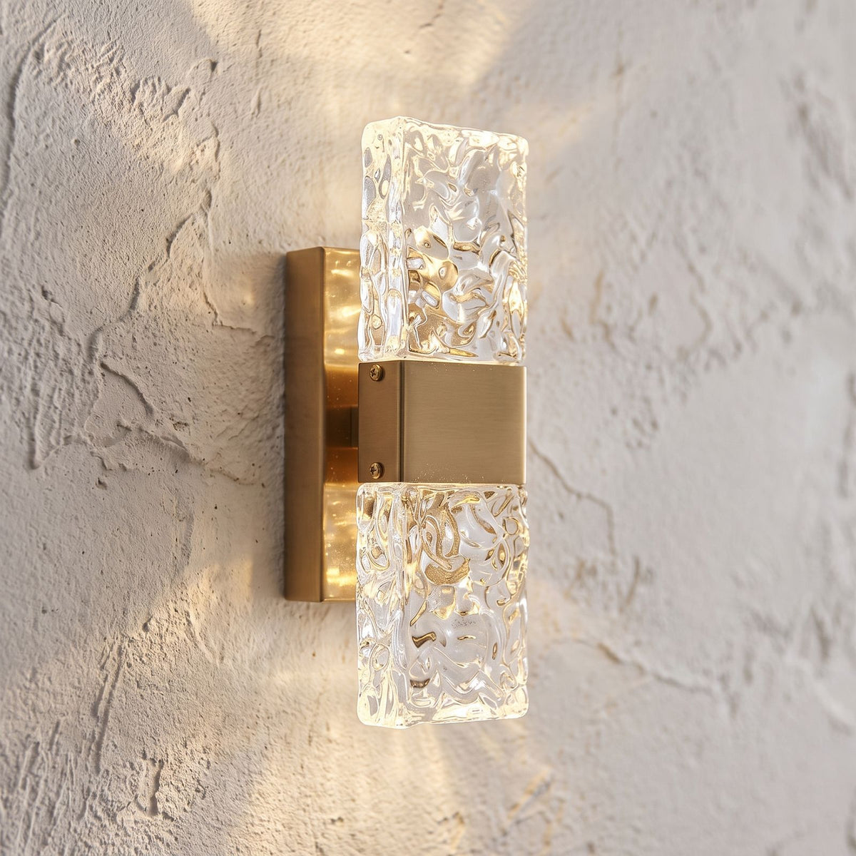 Rectangular Textured Crystal Up Down Wall Light, close view at 45 degrees on a plaster wall