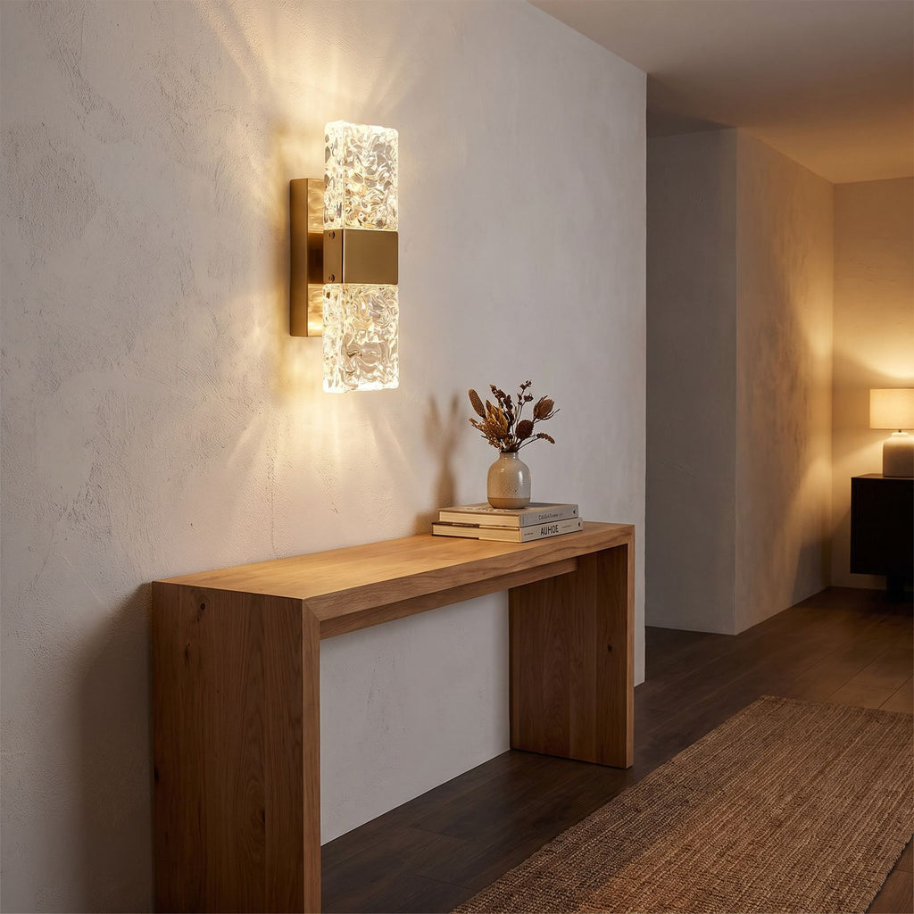 Rectangular Textured Crystal Up Down Wall Light in a hallway above a timber console