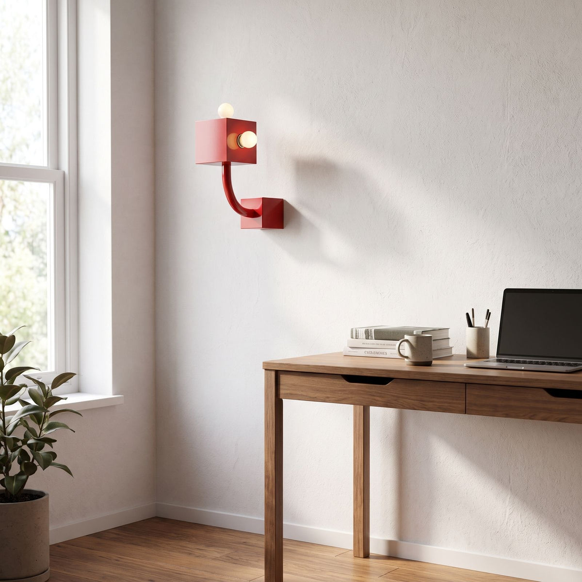 Red Iron Cube Wall Light on a bedroom wall beside the bed