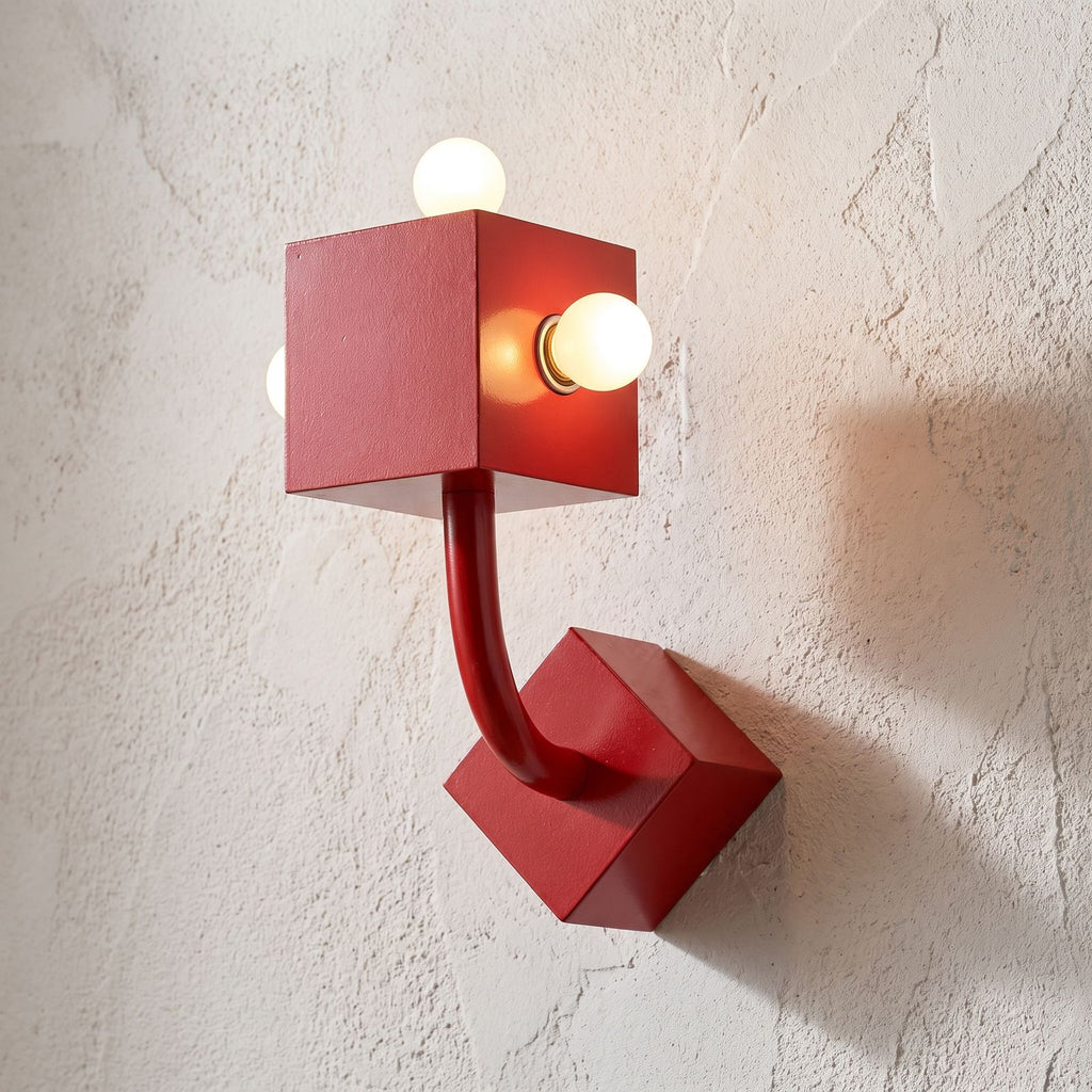 Red Iron Cube Wall Light, close view at 45 degrees on a plaster wall