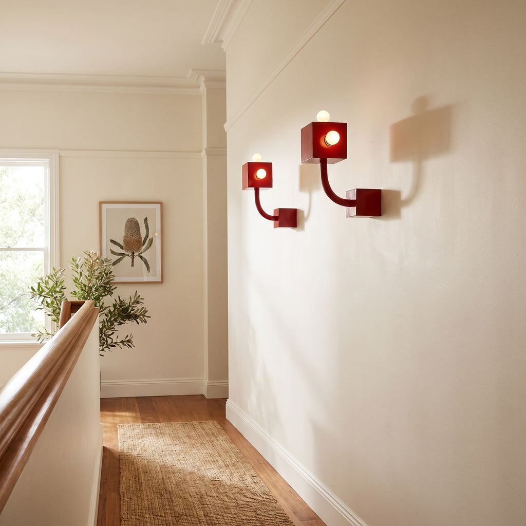 Red Iron Cube Wall Light in a pair on a wall of an Australian home
