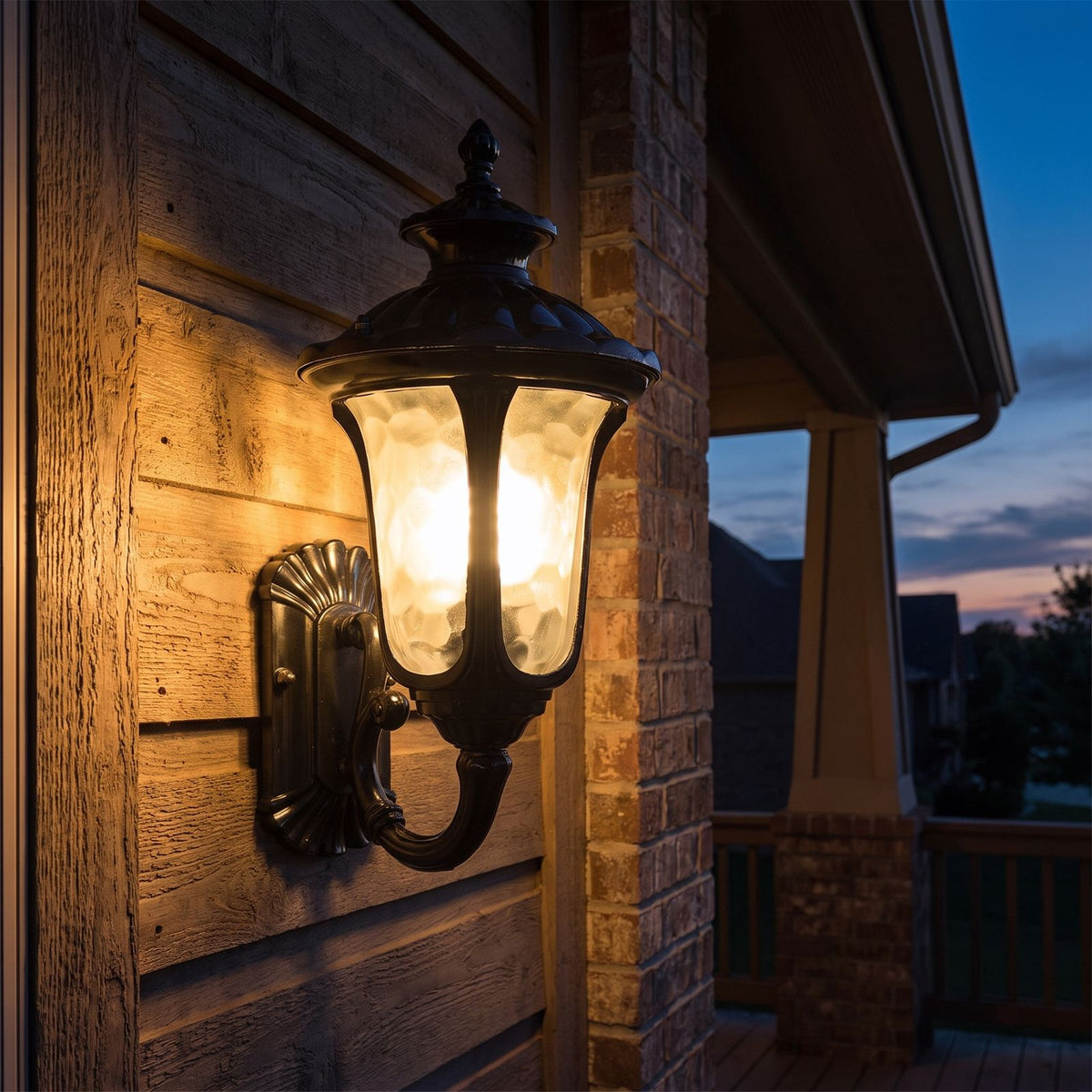 Retro Black Frosted Glass Outdoor Wall Light on a porch wall at dusk