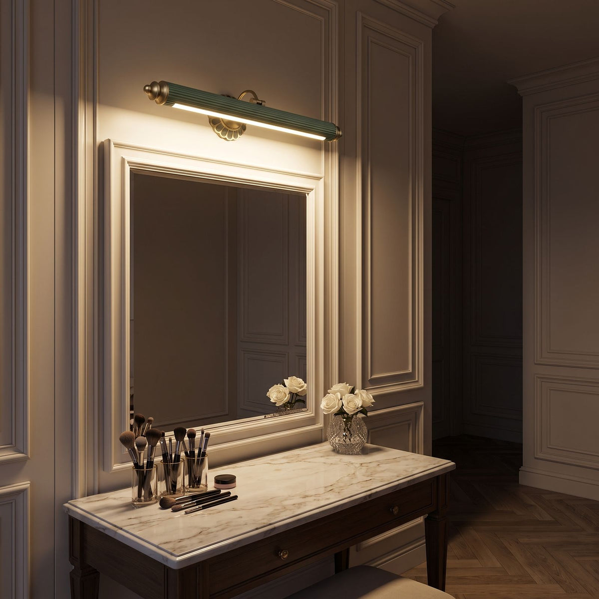 Retro Floral Bronze Cylinder LED Vanity Wall Light above the mirror of a makeup table at night