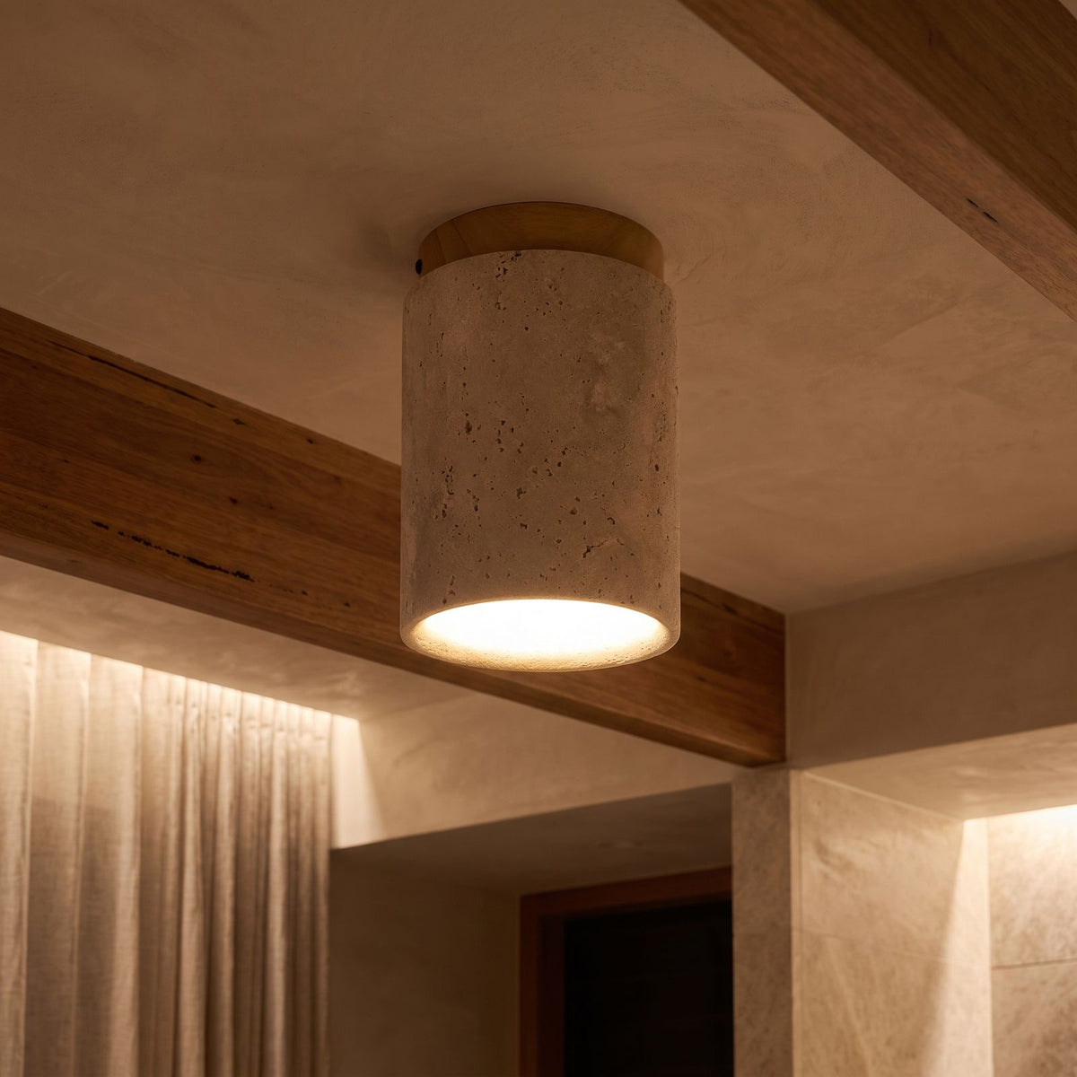 Retro Travertine Shade and Wood Base Ceiling Light glowing on a ceiling at night