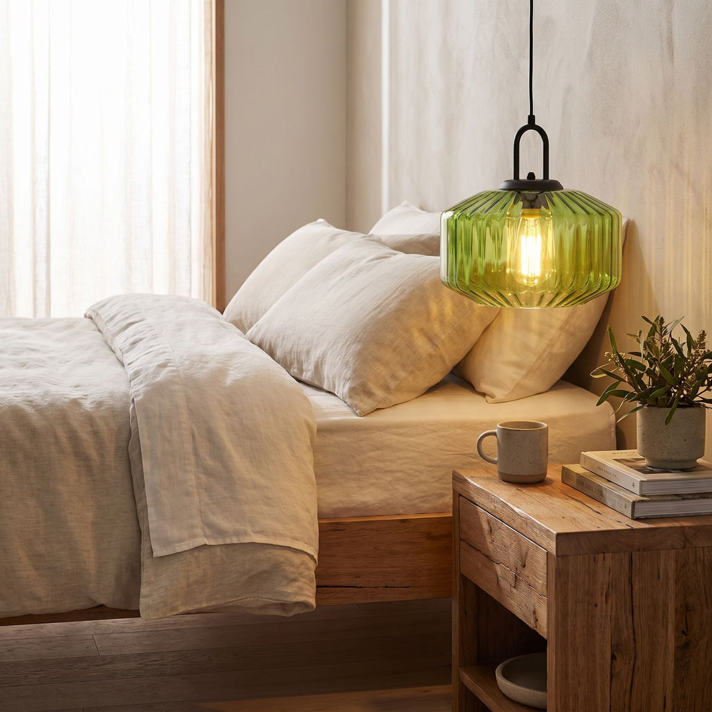 Ribbed Coloured Glass Pendant Light beside a bed as a bedside pendant