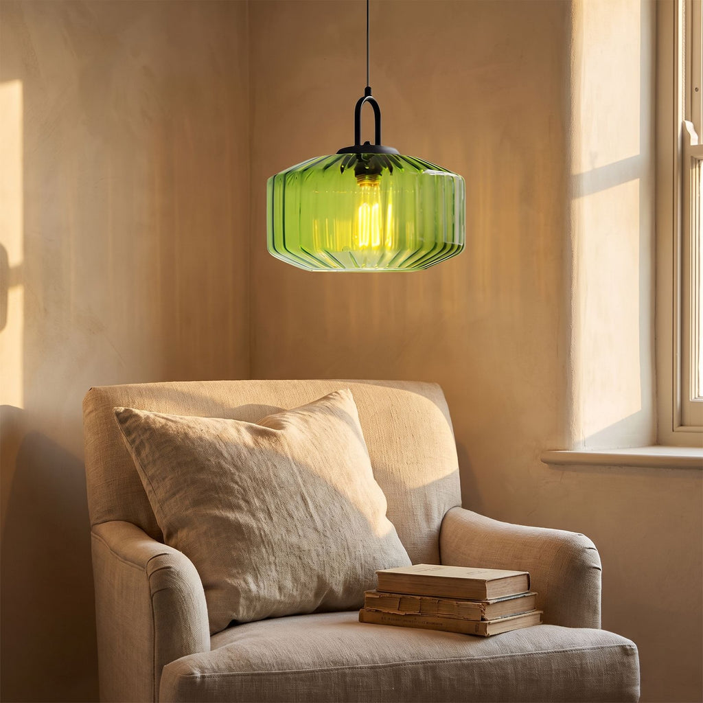 Ribbed Coloured Glass Pendant Light above an armchair in a reading corner