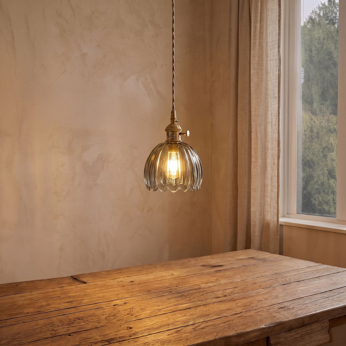 Ribbed Tulip Glass Mini Pendant Light in smoky grey glass above a dining table