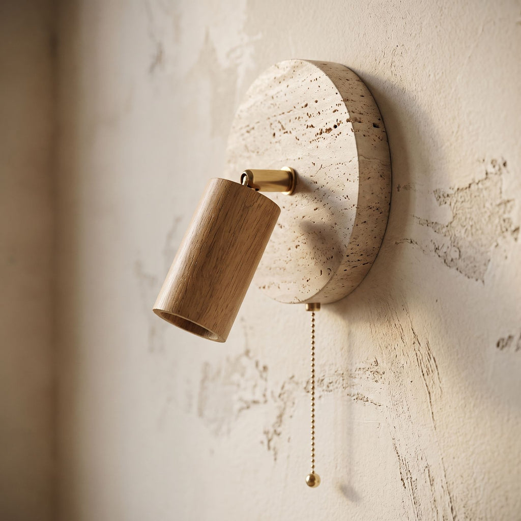 Rotatable Travertine Spotlight Wall Light, close view at 45 degrees on a plaster wall