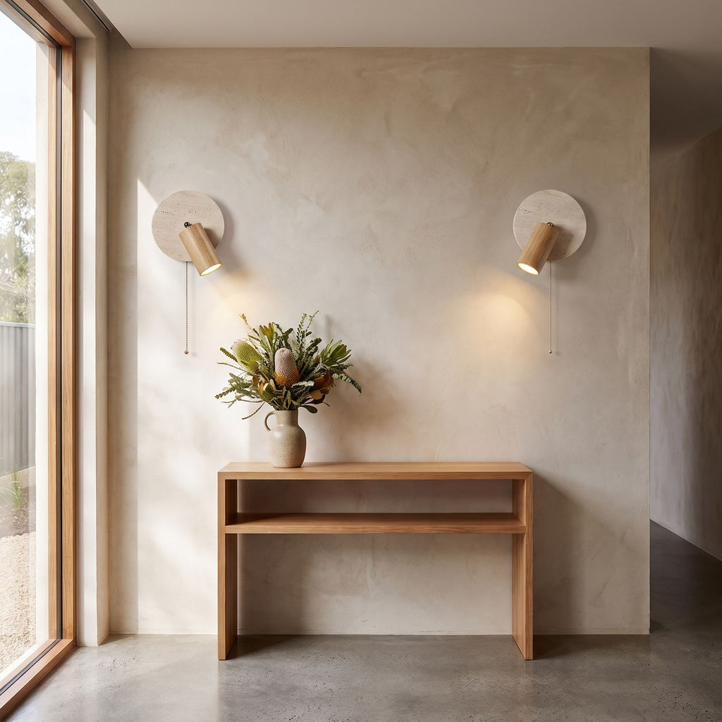 Rotatable Travertine Spotlight Wall Light in a pair on a wall of an Australian home