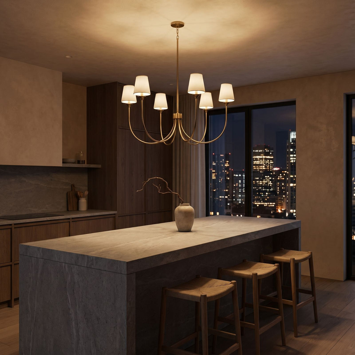 Round Curved Arm Off-White Shade Chandelier above a kitchen island at night