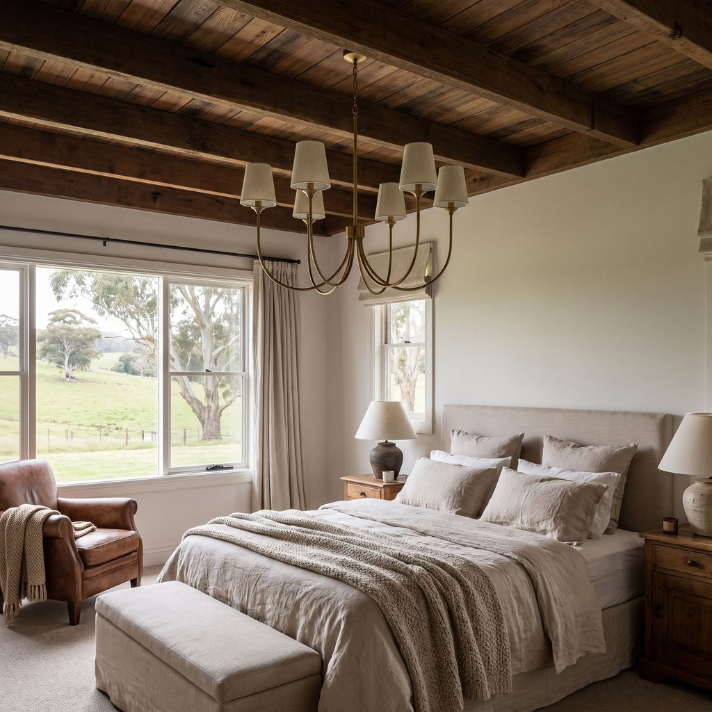 Round Curved Arm Off-White Shade Chandelier in a country homestead bedroom in daylight