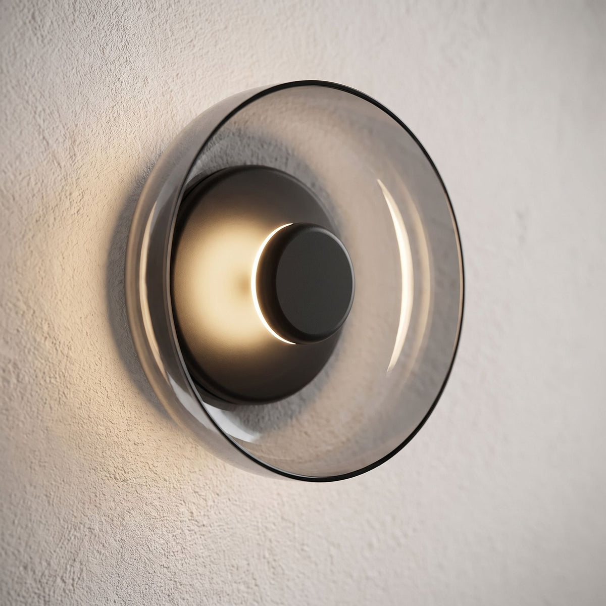 Round Glass Dish LED Wall Light, close view at 45 degrees on a plaster wall