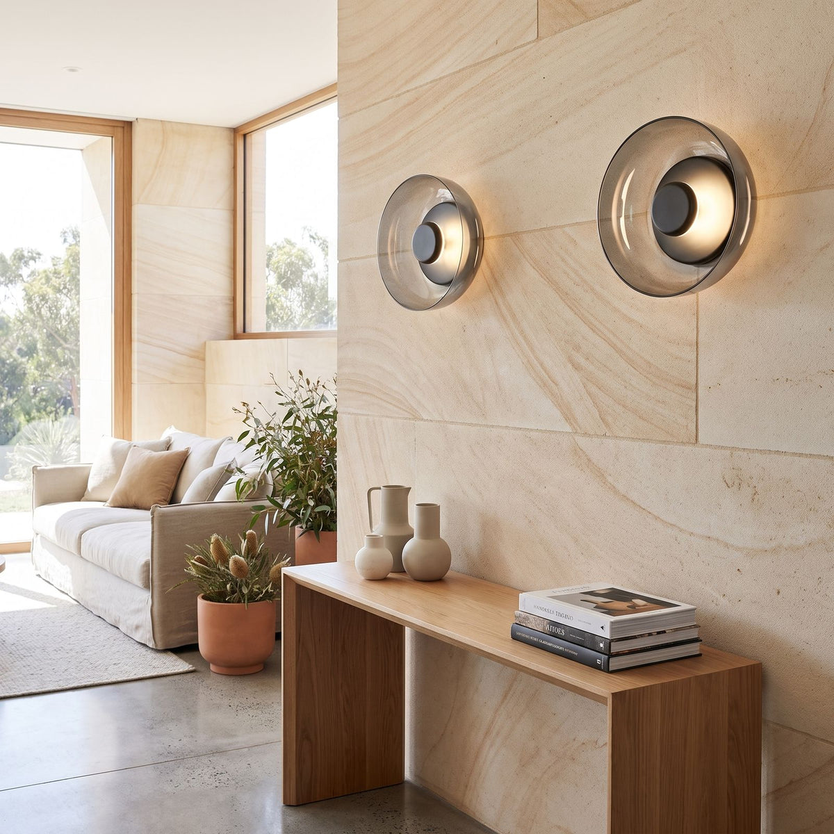 Round Glass Dish LED Wall Light in a pair on a wall of an Australian home