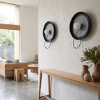 Round Iron Ring Wall Light with Magnetic Bulb in a pair on a wall of an Australian home