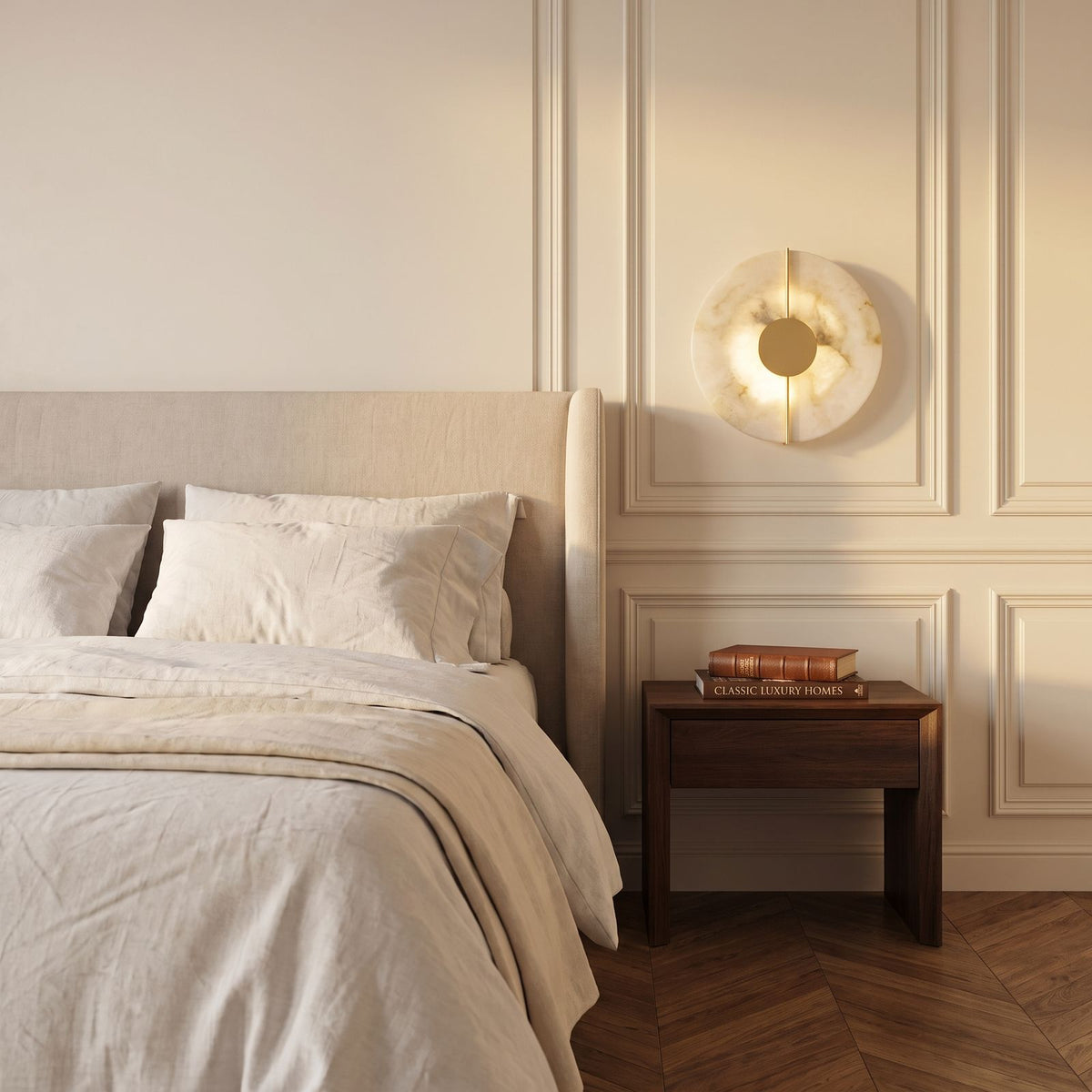 Round Marble and Metal LED Wall Light beside a bed in a bedroom