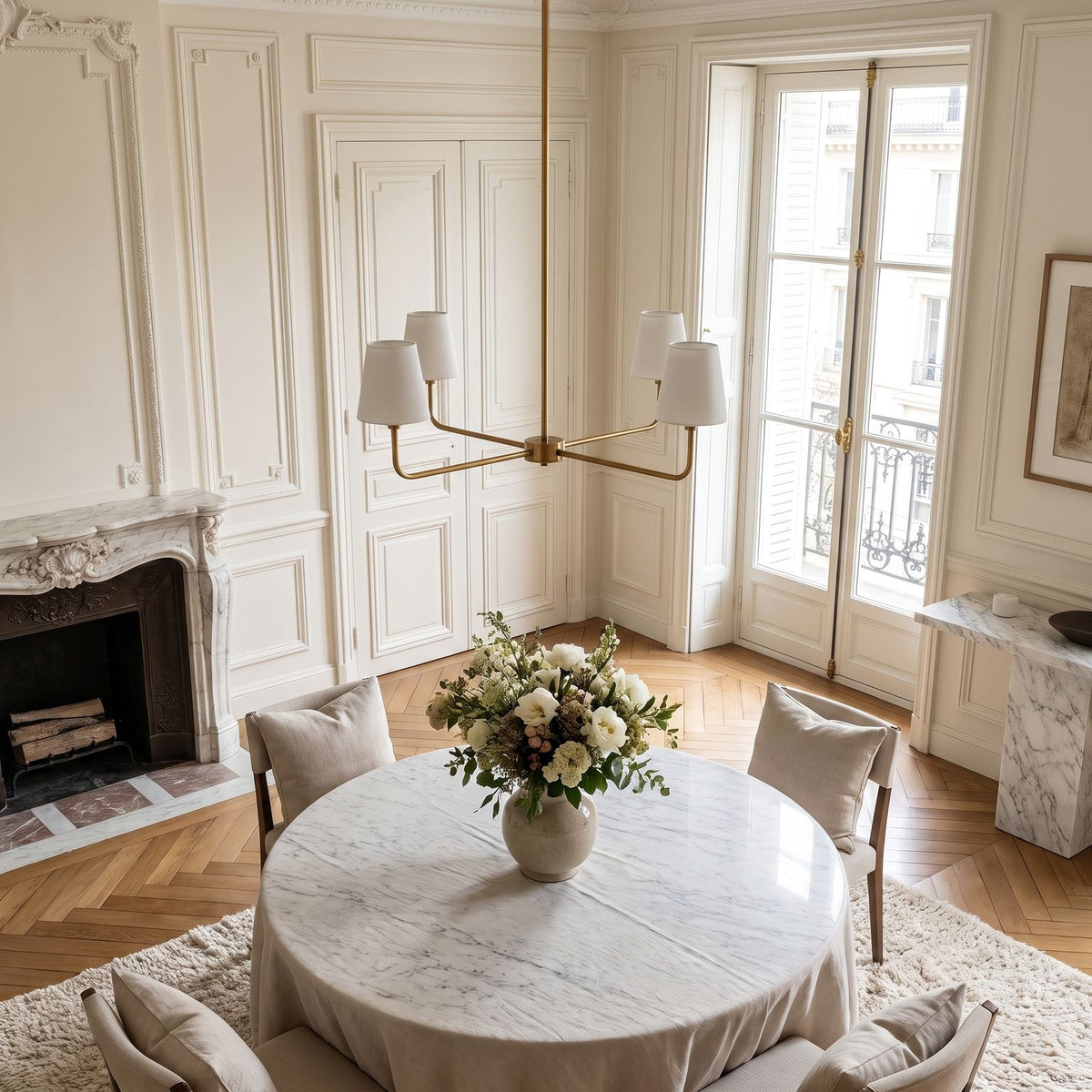 Round Metal Arm Tapered Shade Chandelier in a styled bedroom in soft daylight