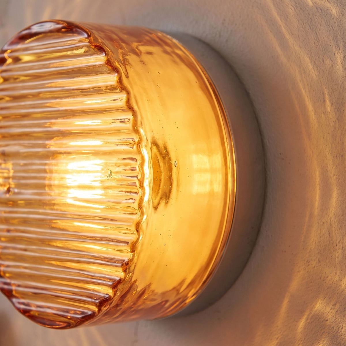 Close-up of the ribbed amber glass