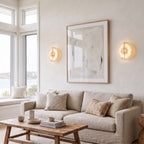 Round Split Marble Disc LED Wall Light pair either side of an artwork above a sofa in a coastal living room