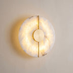 Round Split Marble Disc LED Wall Light close view of the marble disc with the gold line and centre, switched on