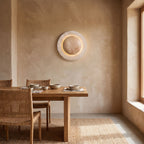 Round Travertine and Wood Shade LED Wall Light on a dining room wall