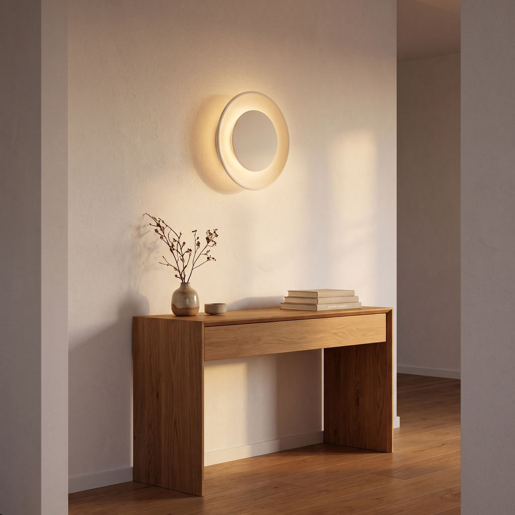 Round White Gypsum and Acrylic Wall Light in a hallway above a timber console