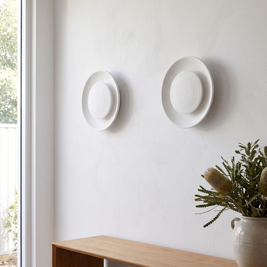 Round White Gypsum and Acrylic Wall Light in a pair on a wall of an Australian home