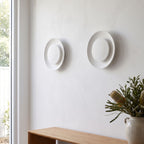Round White Gypsum and Acrylic Wall Light in a pair on a wall of an Australian home
