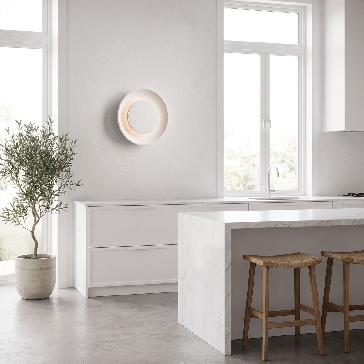 Round White Gypsum and Acrylic Wall Light on a kitchen wall