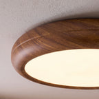 Close-up of the rounded wood grain ring and white diffuser