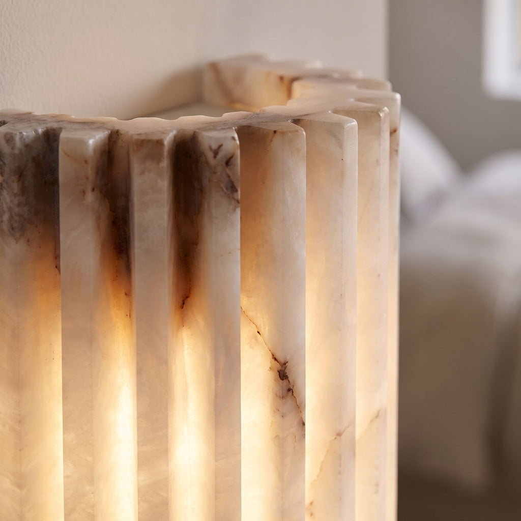 Close-up of the fluted alabaster and scalloped edge