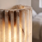 Close-up of the fluted alabaster and scalloped edge