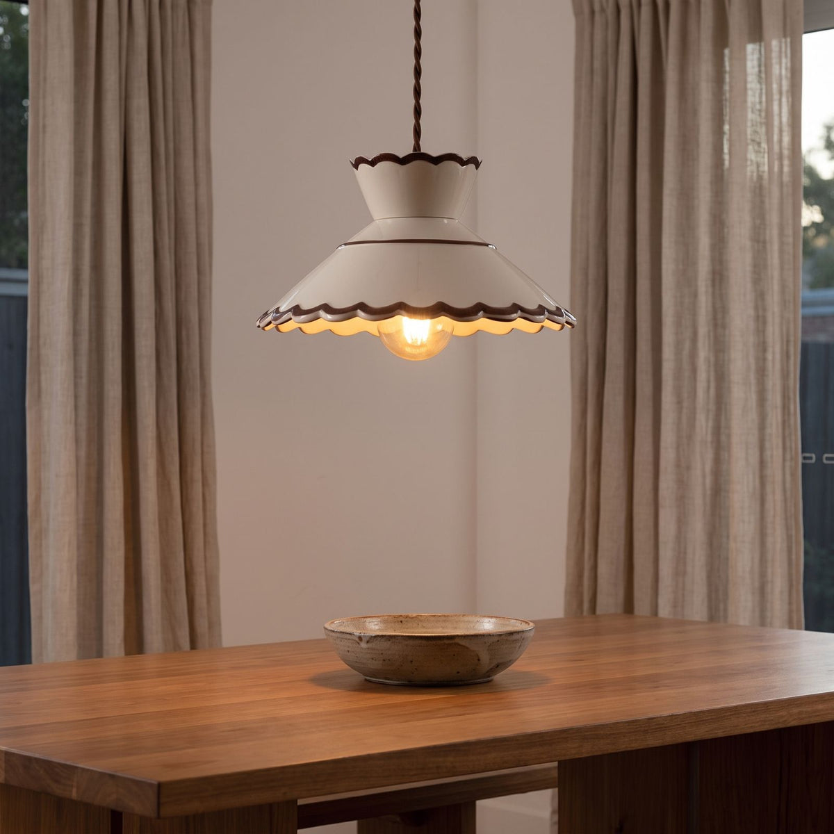 Scalloped Cream Ceramic Pendant Light above a dining table
