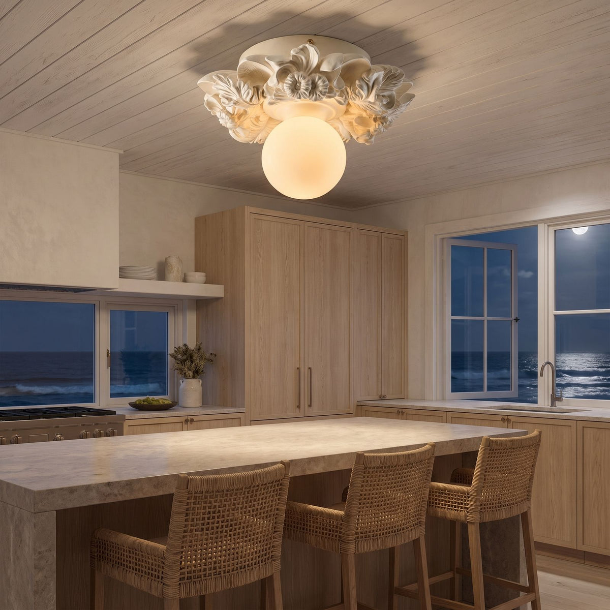 Sculpted Floral Canopy Opal Glass Flush Mount Ceiling Light above a kitchen island at night