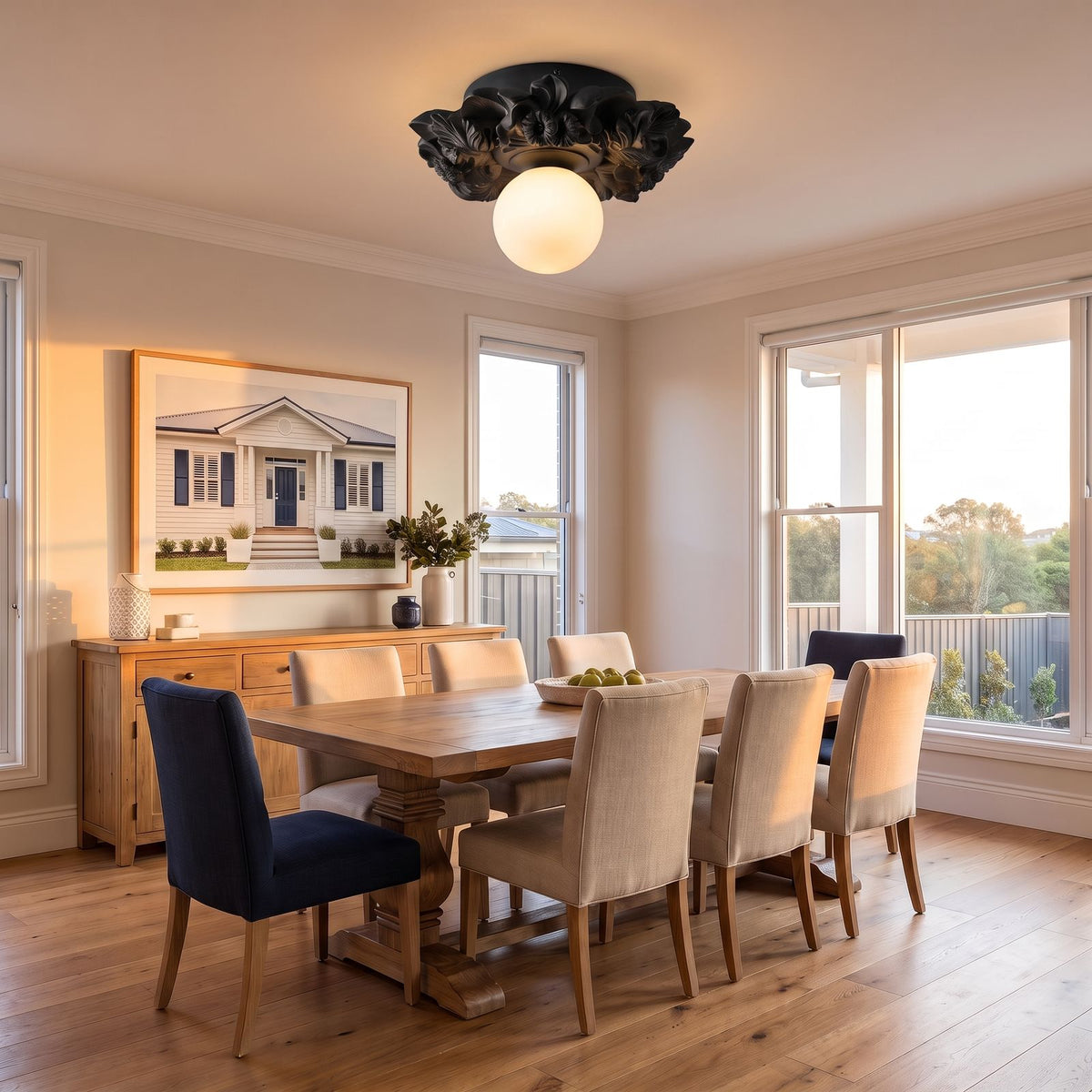 Sculpted Floral Canopy Opal Glass Flush Mount Ceiling Light in black, above a dining table