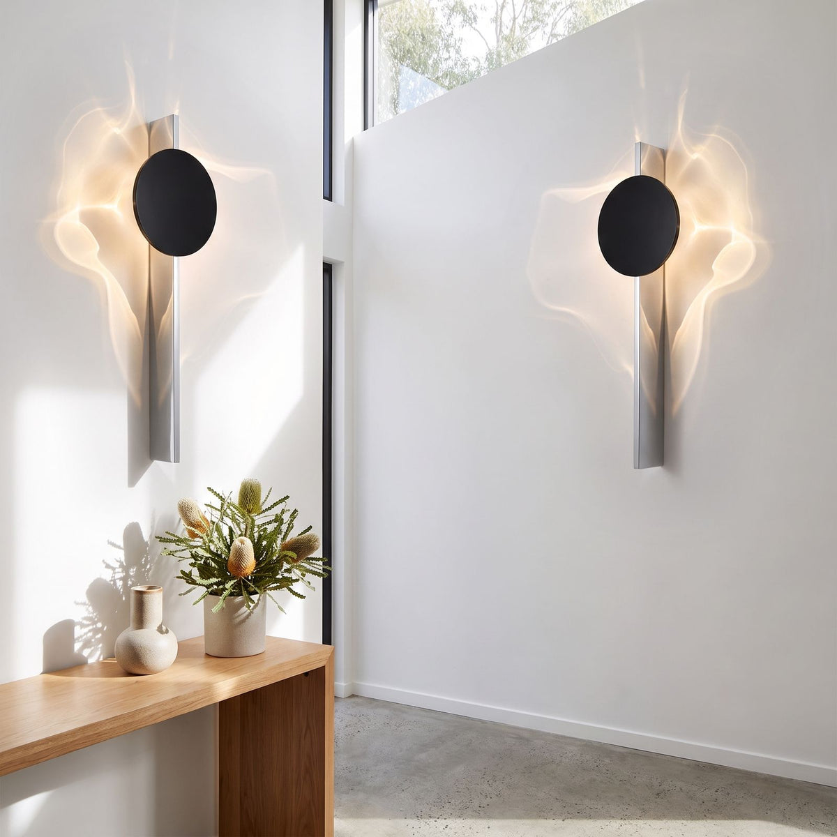 Shadow Casting Aluminium and Glass Wall Light in a pair on a wall of an Australian home