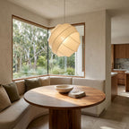 Silk Ball Japandi LED Pendant Light above a round table in a breakfast nook