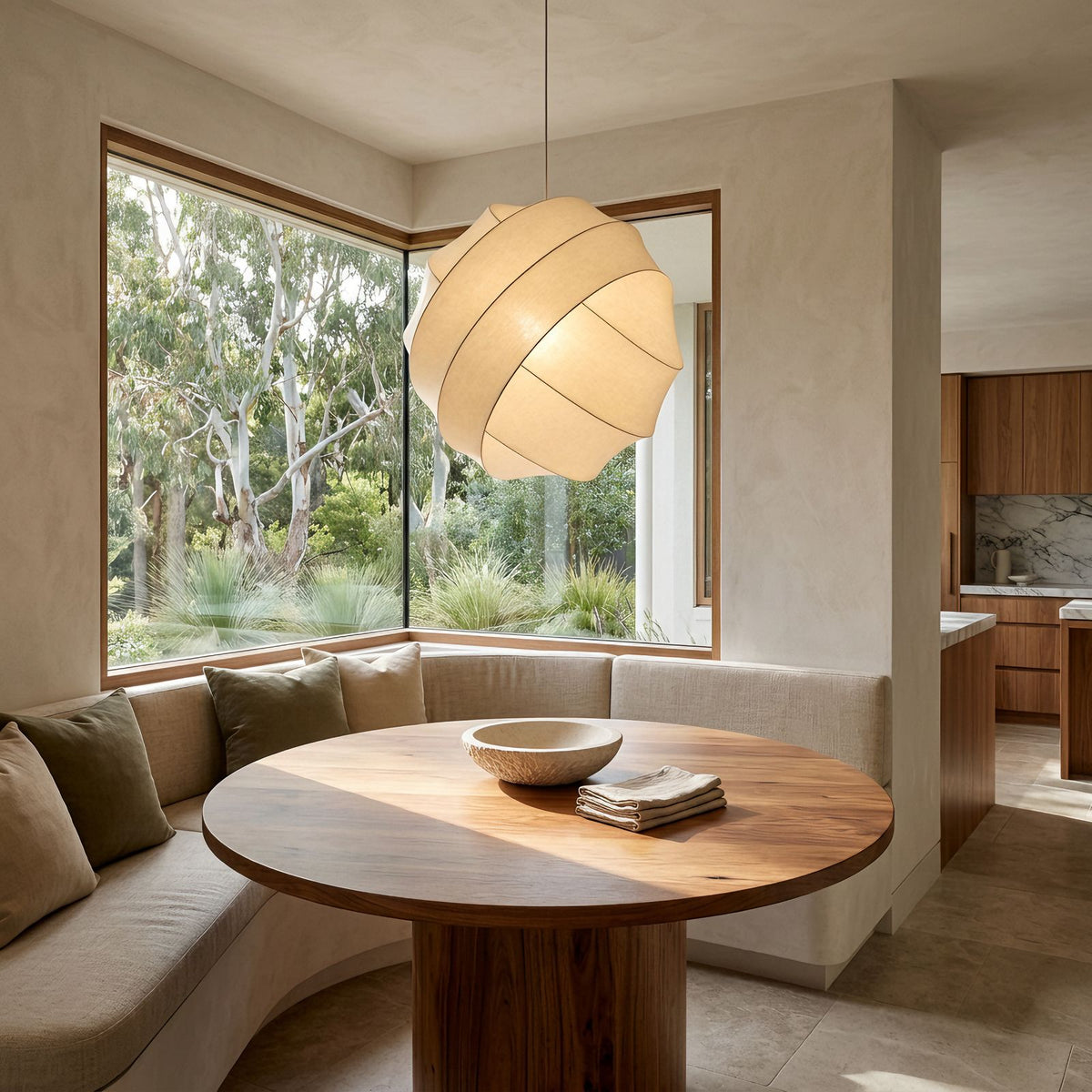 Silk Ball Japandi LED Pendant Light above a round table in a breakfast nook