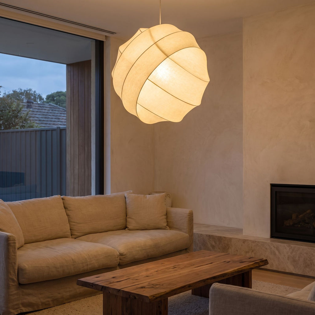 Silk Ball Japandi LED Pendant Light above a linen sofa in a living room