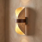Silk Half-Cylinder Up-Down Wall Light, close view at 45 degrees on a plaster wall