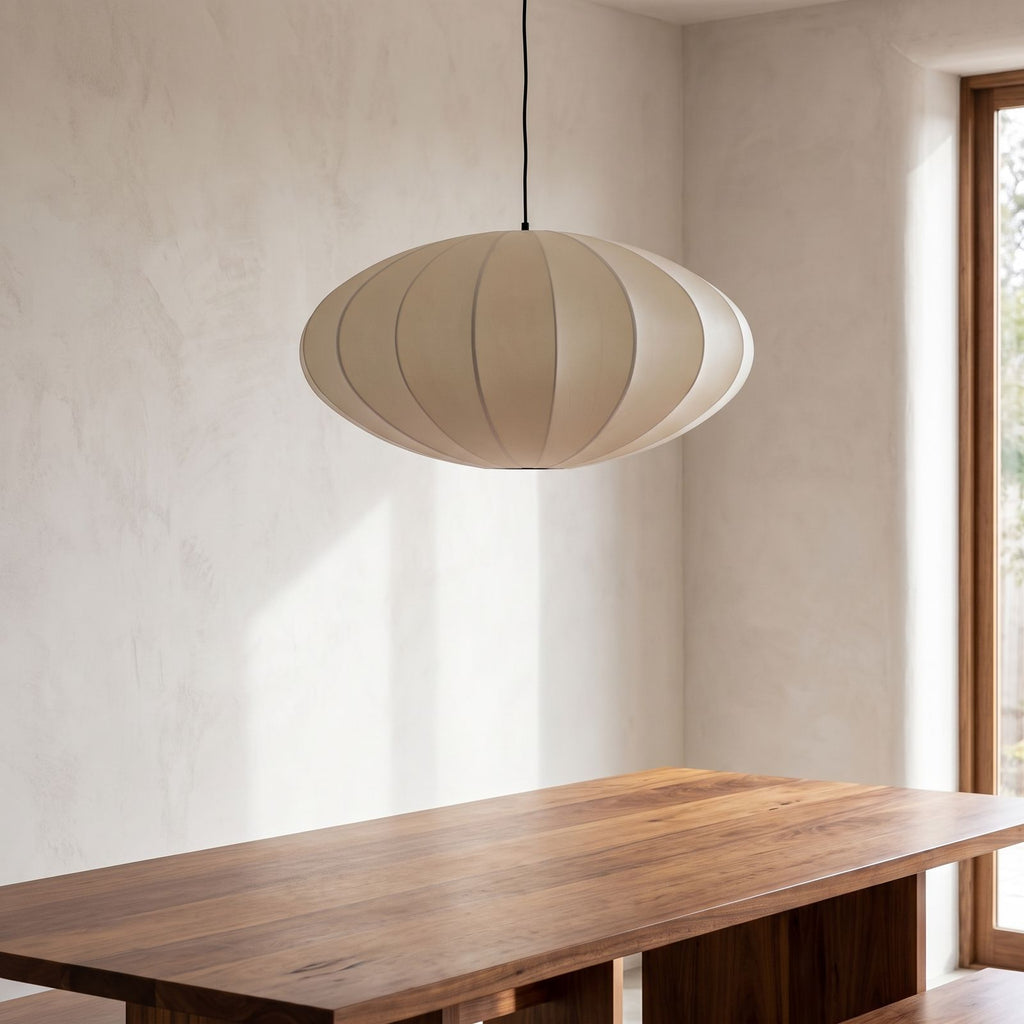 Silk Pumpkin Lantern Japandi Pendant Light above a timber dining table