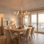 Six Arm Distressed Candle Chandelier above a dining table at golden hour