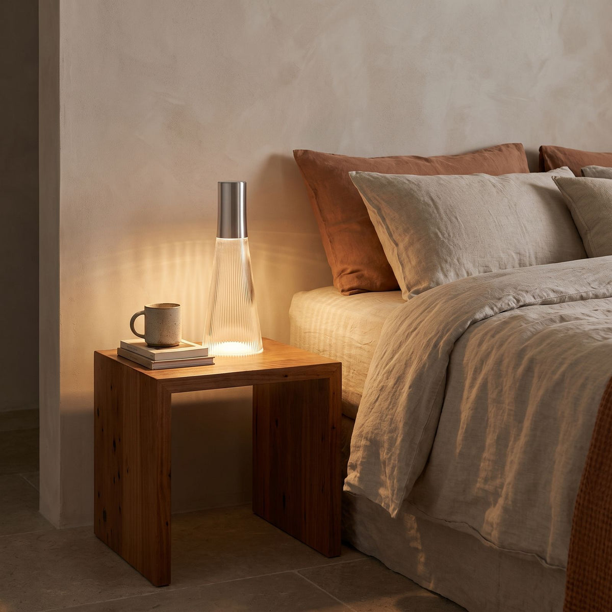 Slim Acrylic Rechargeable Touch Table Lamp on a bedside table