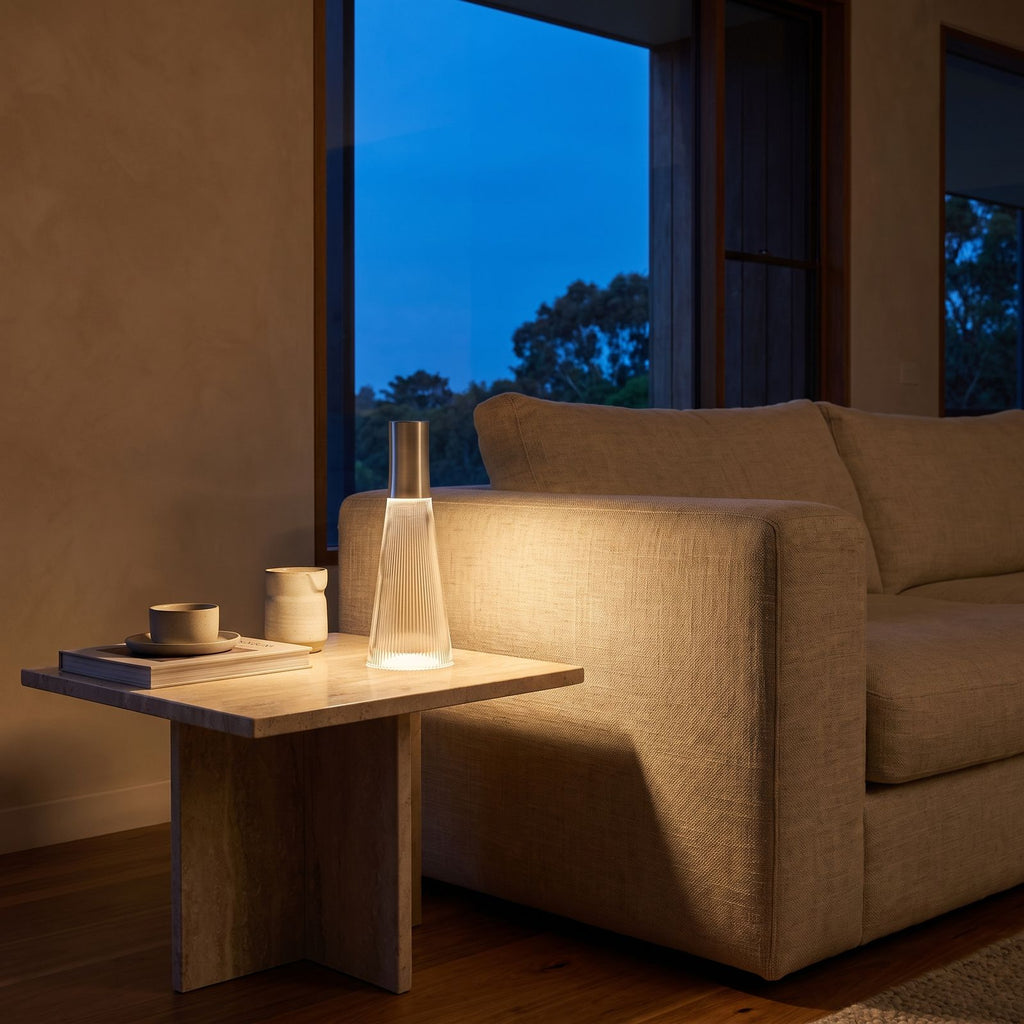 Slim Acrylic Rechargeable Touch Table Lamp on a side table beside a sofa