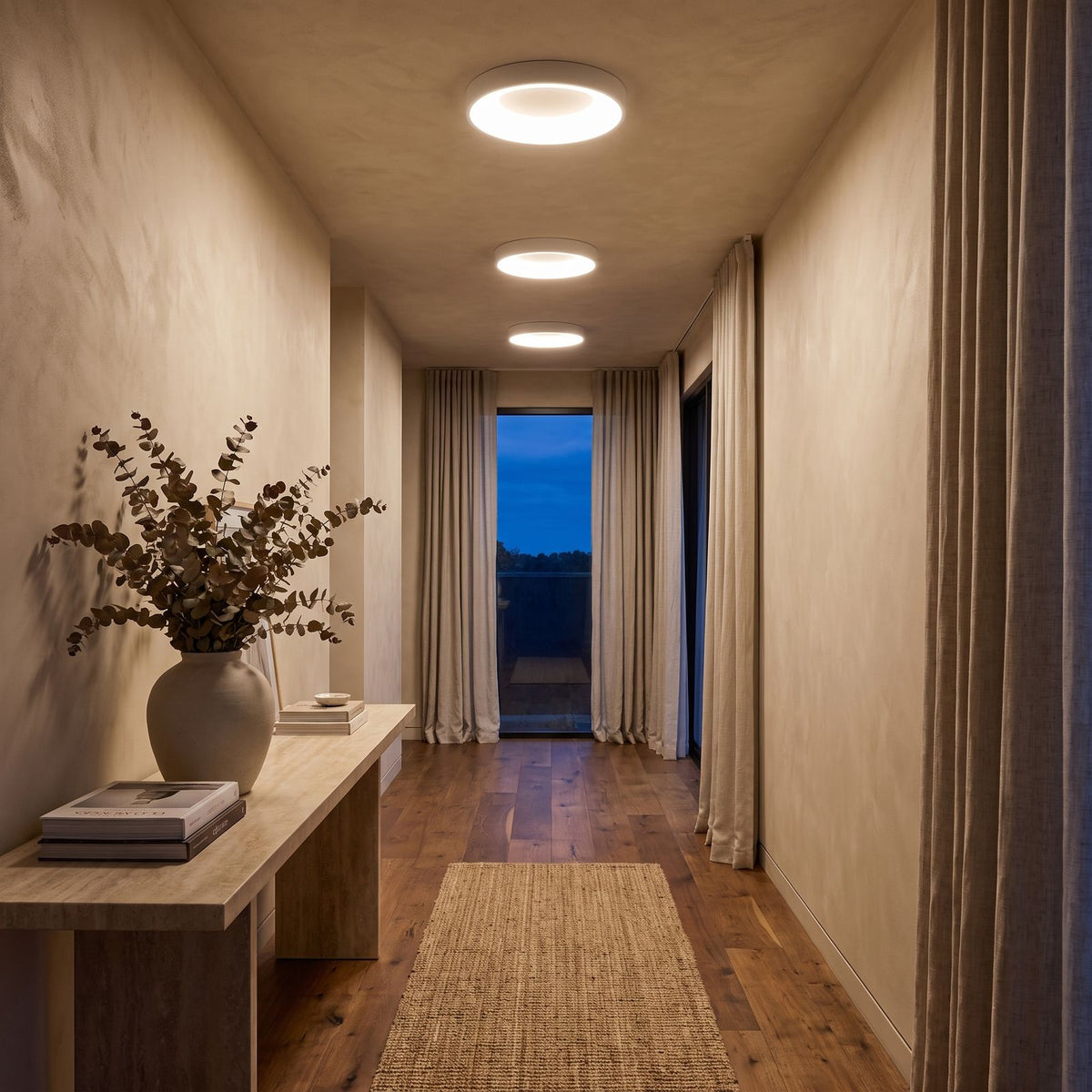 Slim Acrylic Ring LED Ceiling Lights along a hallway ceiling