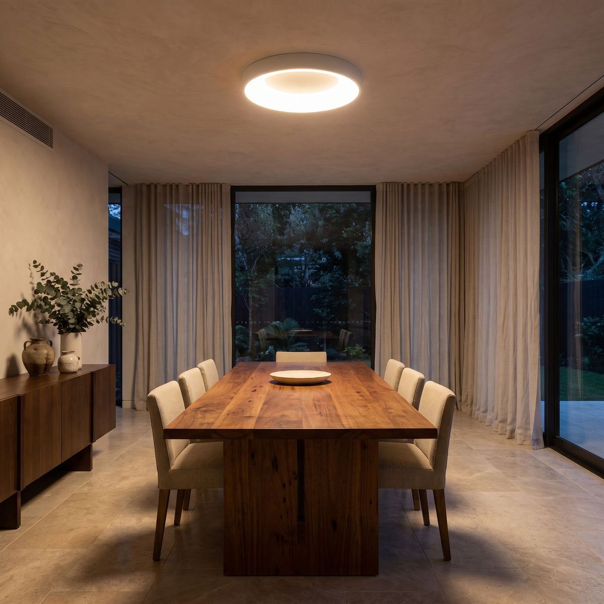 Slim Acrylic Ring LED Ceiling Light above a dining area