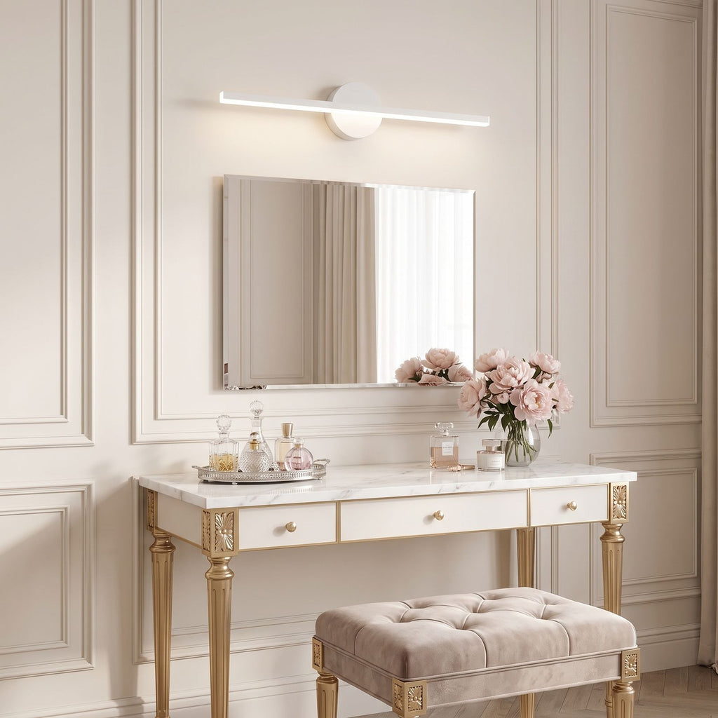 Slim Aluminium Disc and Bar LED Vanity Wall Light above the mirror of a dressing table