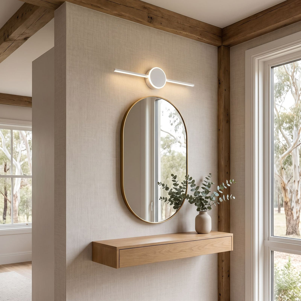 Slim Aluminium Disc and Bar LED Vanity Wall Light 60 cm above a hallway mirror