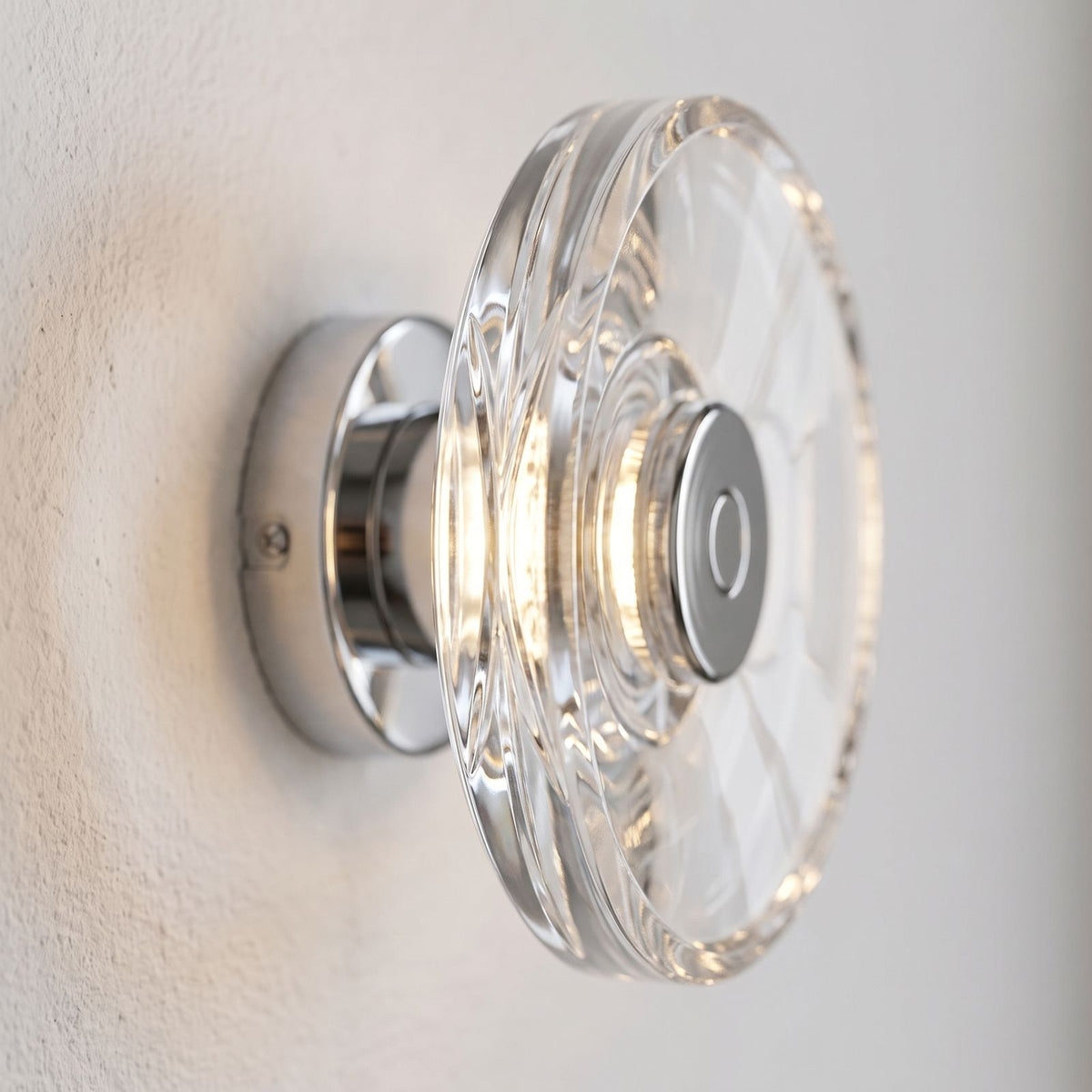 Slim Crystal Disc LED Wall Light, close view at 45 degrees on a plaster wall
